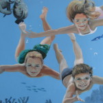 Hand Painted Custom Murals. this mural shows three children swimming under the water toward the observer