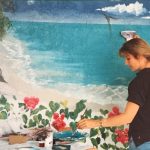 Martha painting an outdoor poolside mural in the 90's.