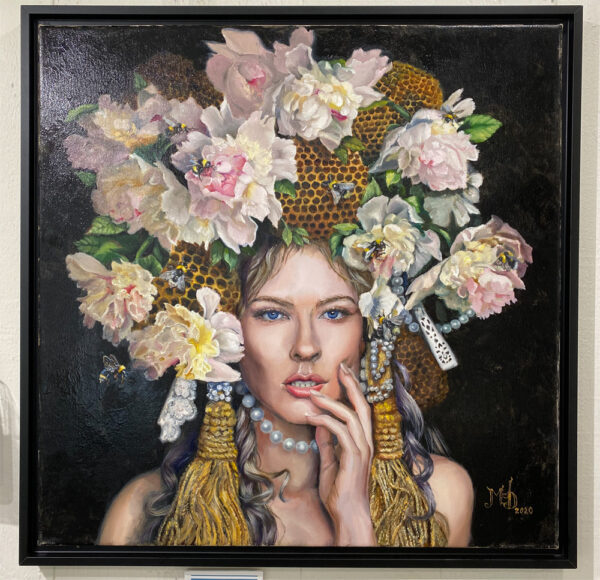 painting entitled queen bee of a womans face with a crown of flowers and honeycombs. there are bees flying around her crown. by martha dodd