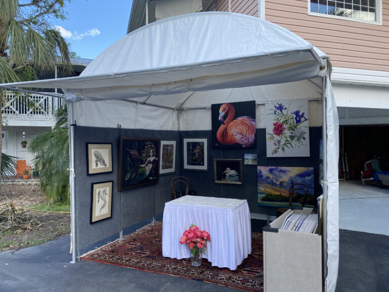 martha's art tent, sitting in her driveway with her art hanging inside